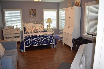 Each birth room offers a large bed for both parents to enjoy cuddling with the new baby.